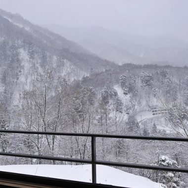 〔新館〕展望風呂付き客室雪景色